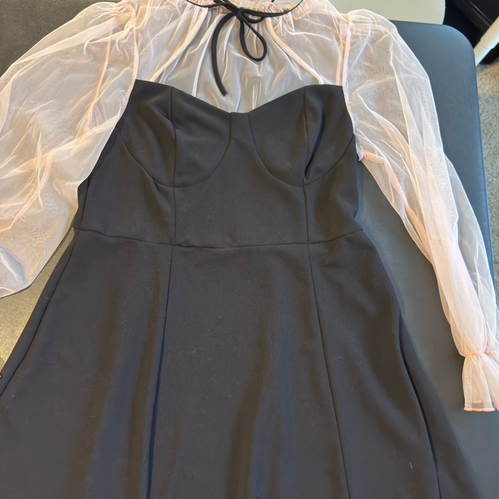 Elegant Black Dress with Sheer Pink Sleeves